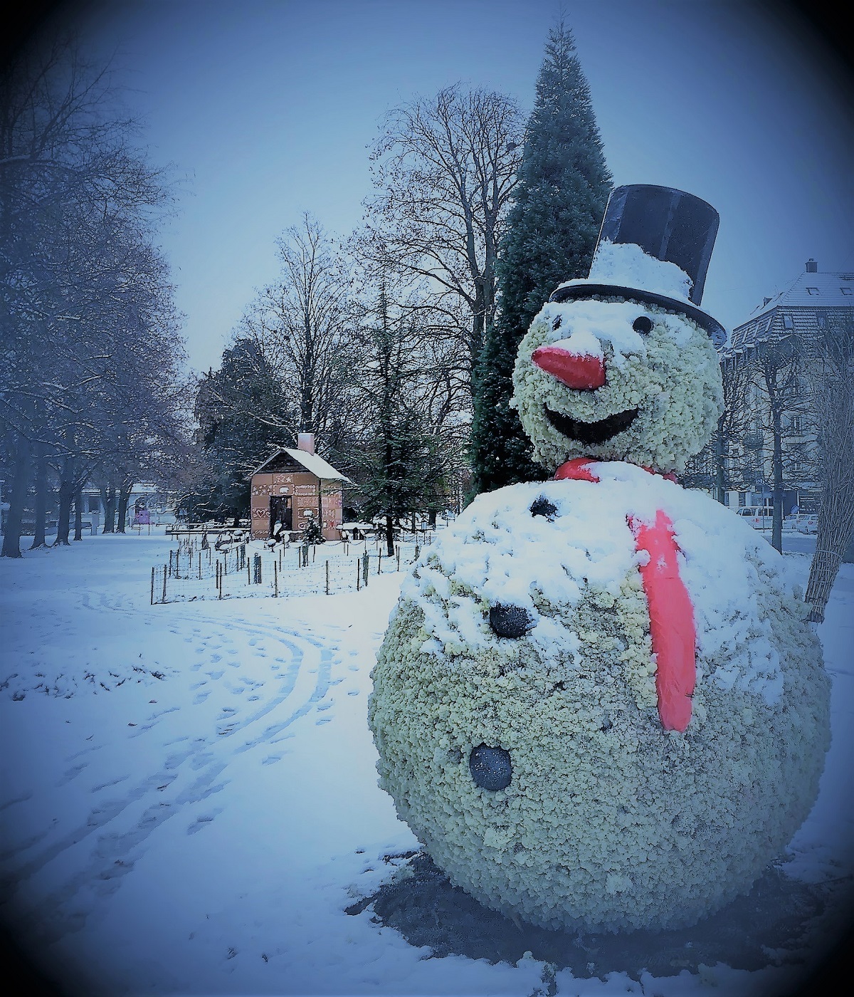 The snowman wishes everyone Merry Christmas and a Happy New Year.